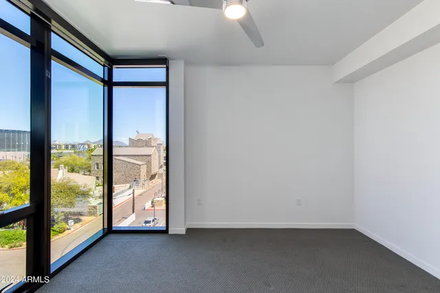 a view of an empty room and window