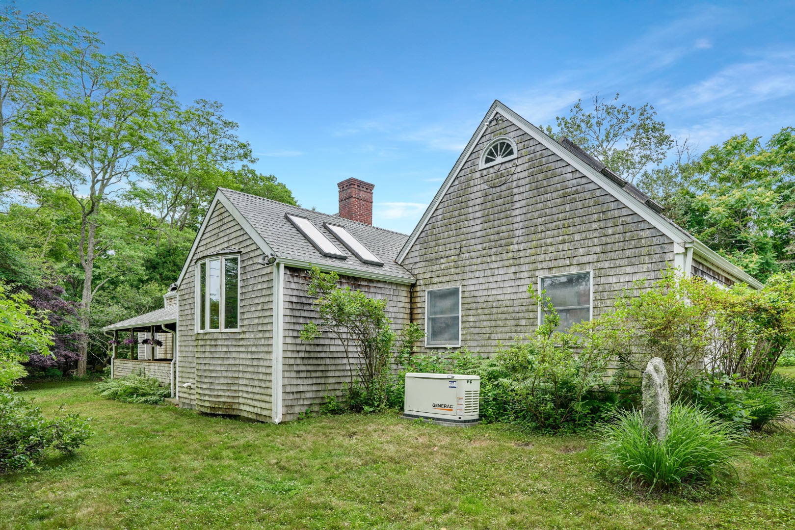 174 Middle Road Chilmark, MA 02535 - Photo 40 of 40 a view of a house with a yard