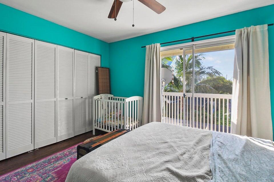 6335 Riverwalk Lane, Unit 3 Jupiter, FL 33458 - Photo 16 of 20 a view of a livingroom with furniture and a window