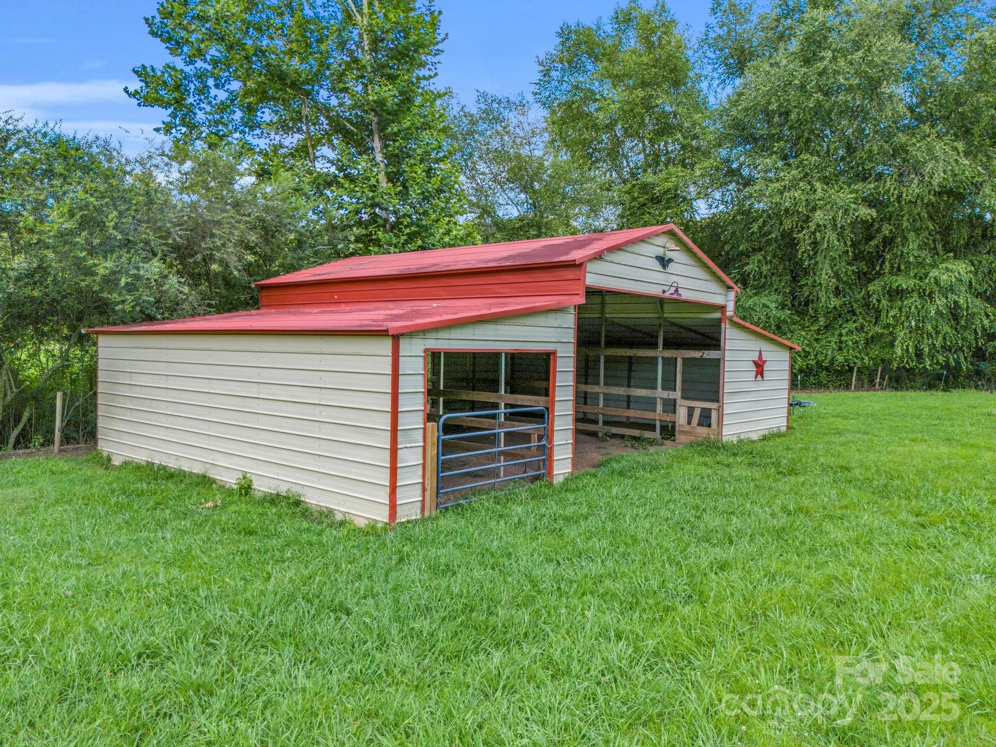 651 V S Dalton Road Rutherfordton, NC 28139 - Photo 43 of 48 a view of a house with a yard