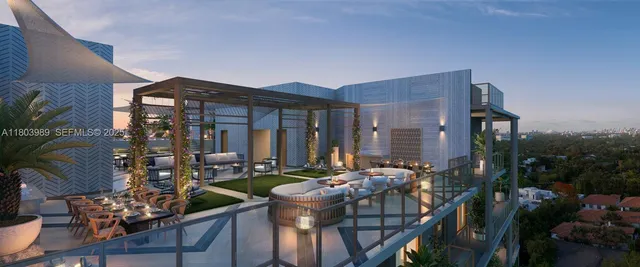 a view of a patio with couches table and chairs and potted plants