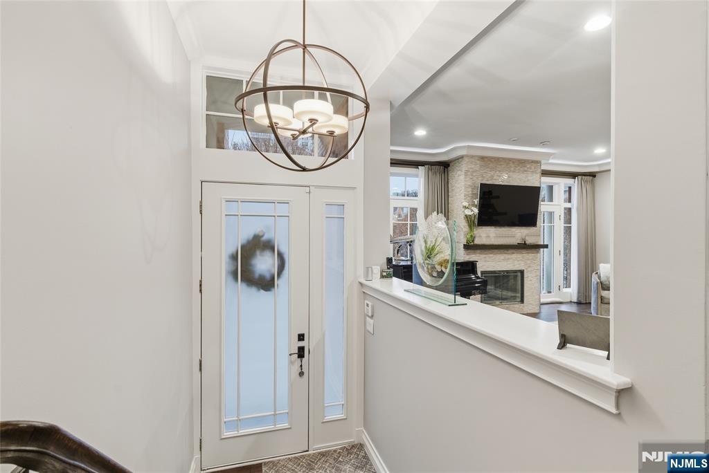 119 Hudson Cove Edgewater, NJ 07020 - Photo 20 of 44 a kitchen with stainless steel appliances granite countertop a microwave a stove and a sink