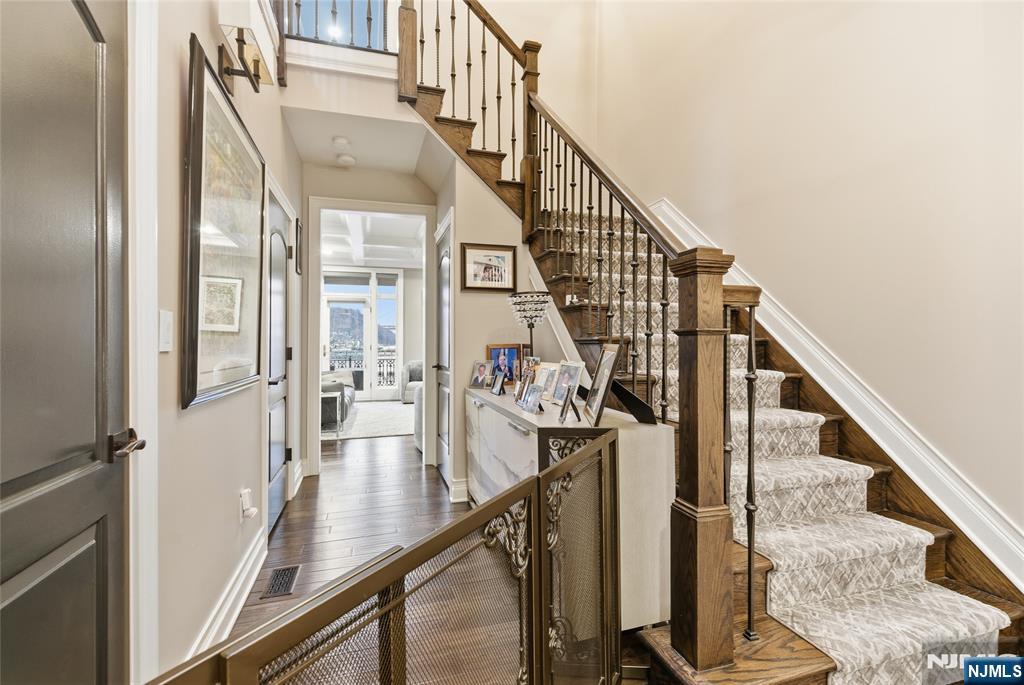 119 Hudson Cove Edgewater, NJ 07020 - Photo 21 of 44 a view of entryway and hall with wooden floor