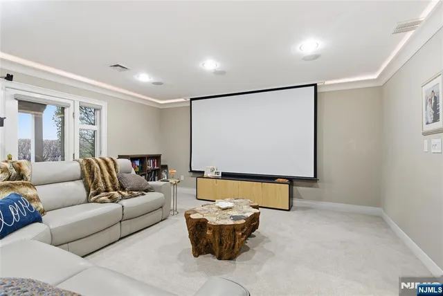 a living room with furniture and window