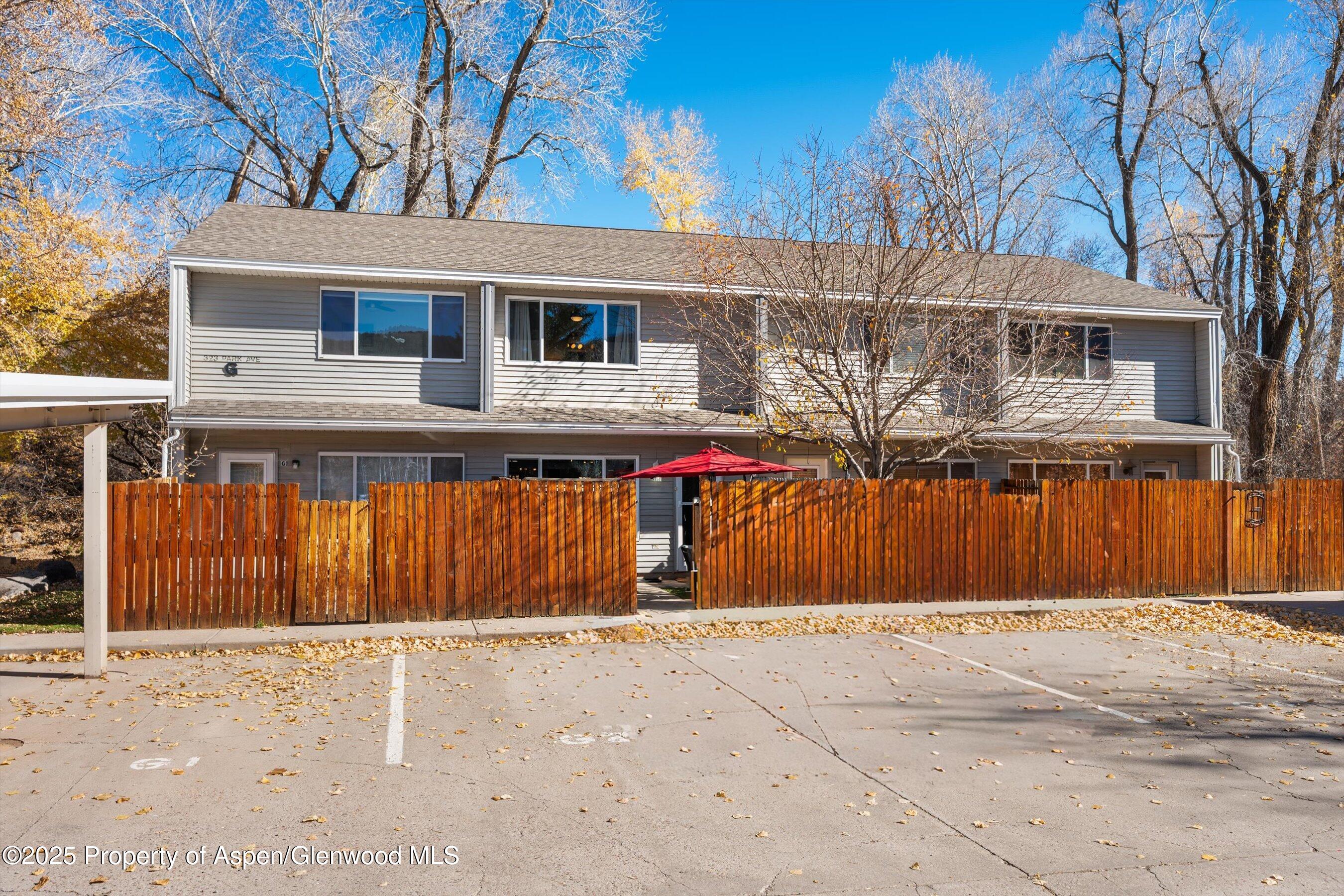 323 Park Avenue, Unit G2 Basalt, CO 81621 - Photo 13 of 17 a front view of a house with a yard