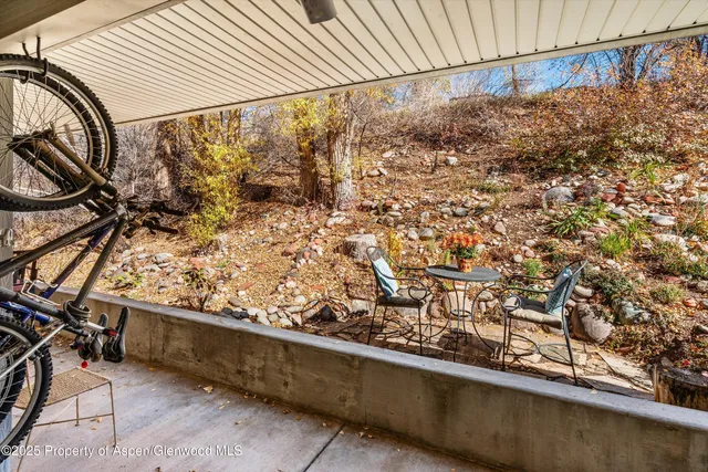 a view of a yard from a balcony
