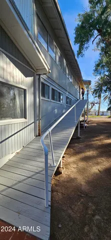 a view of backyard of a house