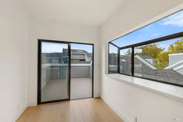 a view of a dining room with furniture window and outside view