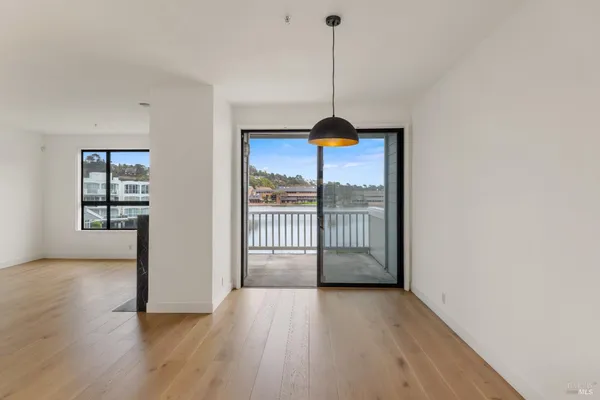 a spacious bathroom with a double vanity sink and a mirror