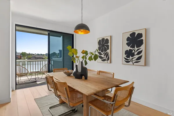 a spacious bathroom with a granite countertop sink and a mirror