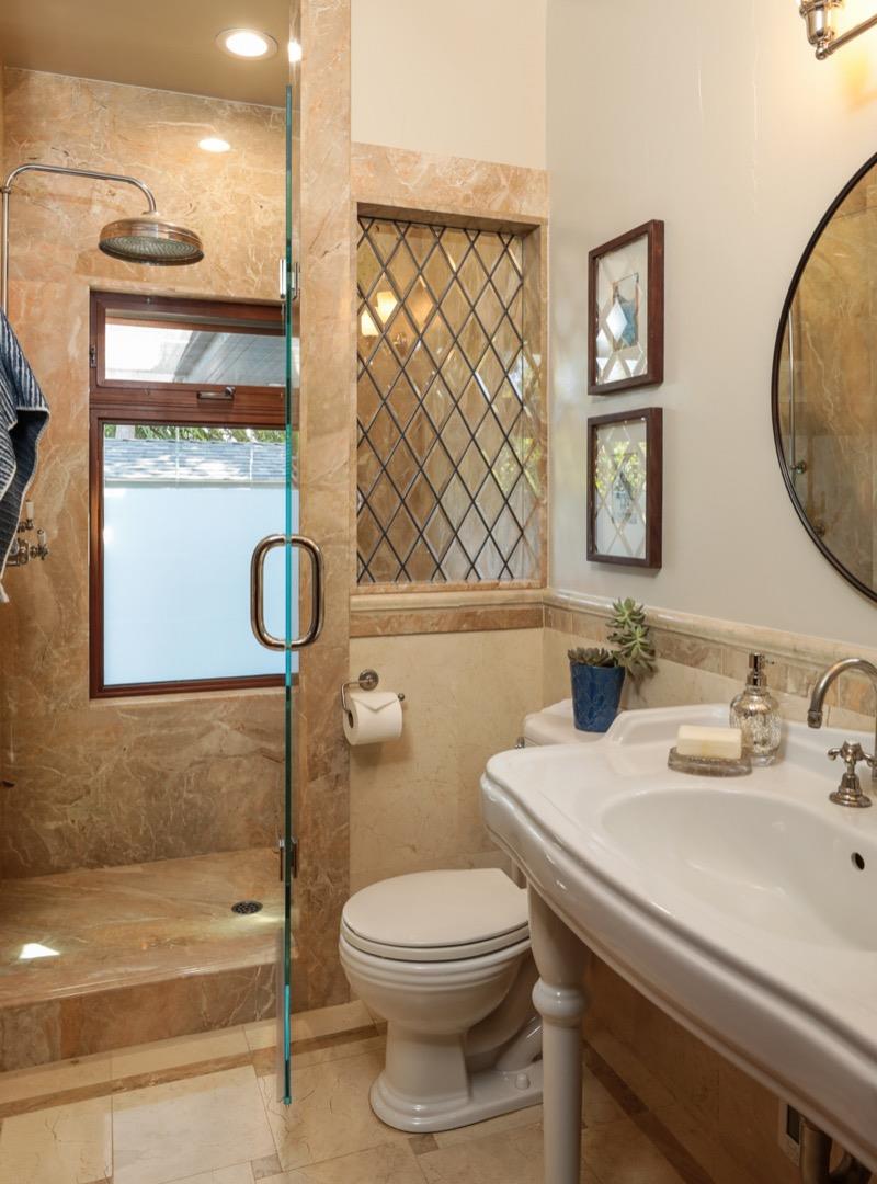 255 Lyell Street Los Altos, CA 94022 - Photo 22 of 50 a bathroom with a sink a toilet and a mirror