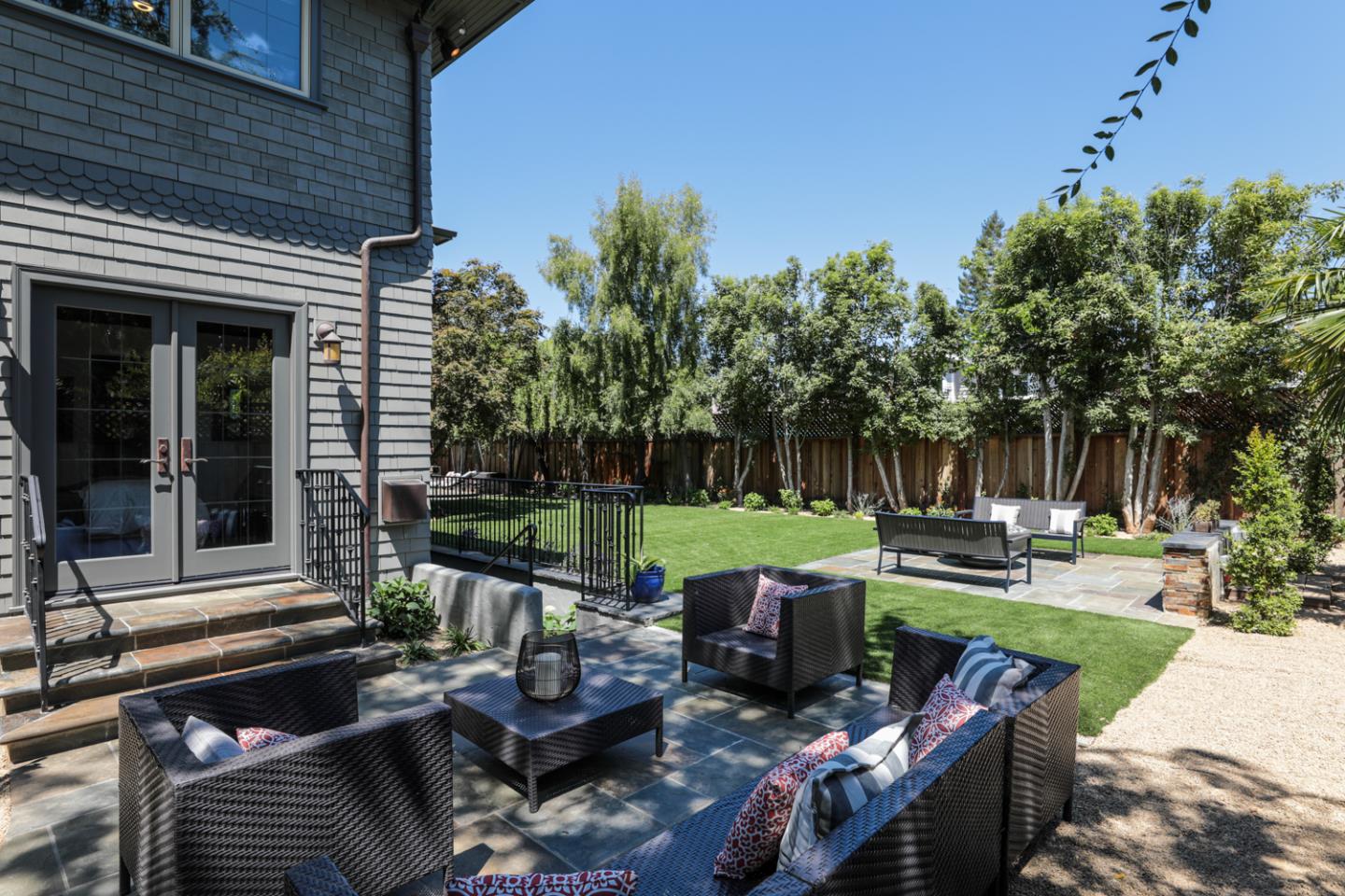 255 Lyell Street Los Altos, CA 94022 - Photo 27 of 50 a view of a patio with couches chairs and a yard