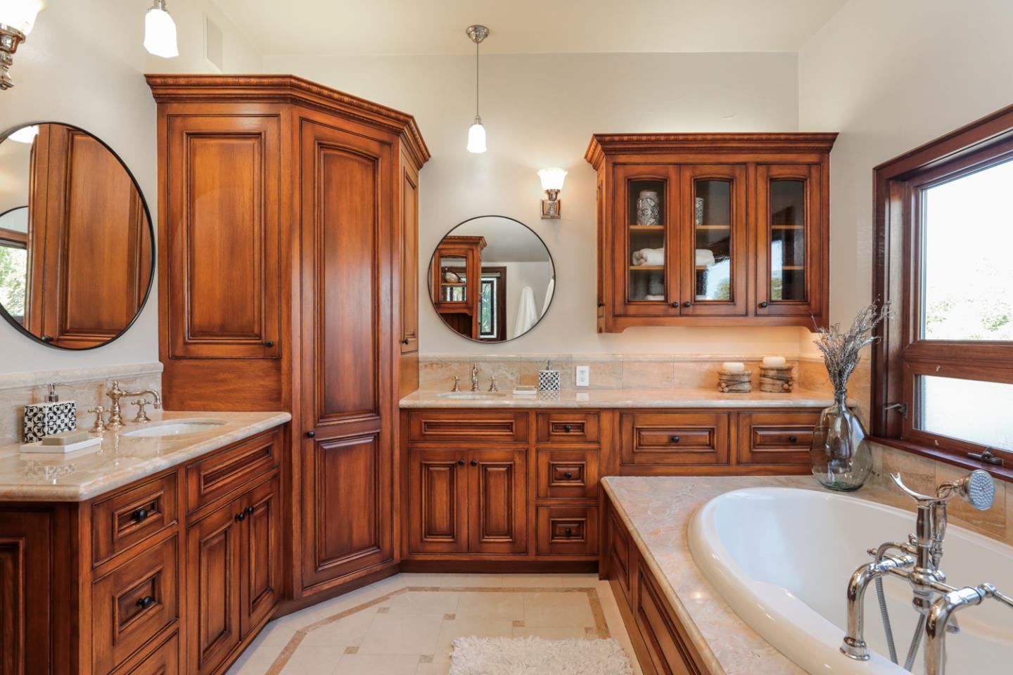 255 Lyell Street Los Altos, CA 94022 - Photo 35 of 50 a bathroom with a granite countertop double vanity sink and a mirror