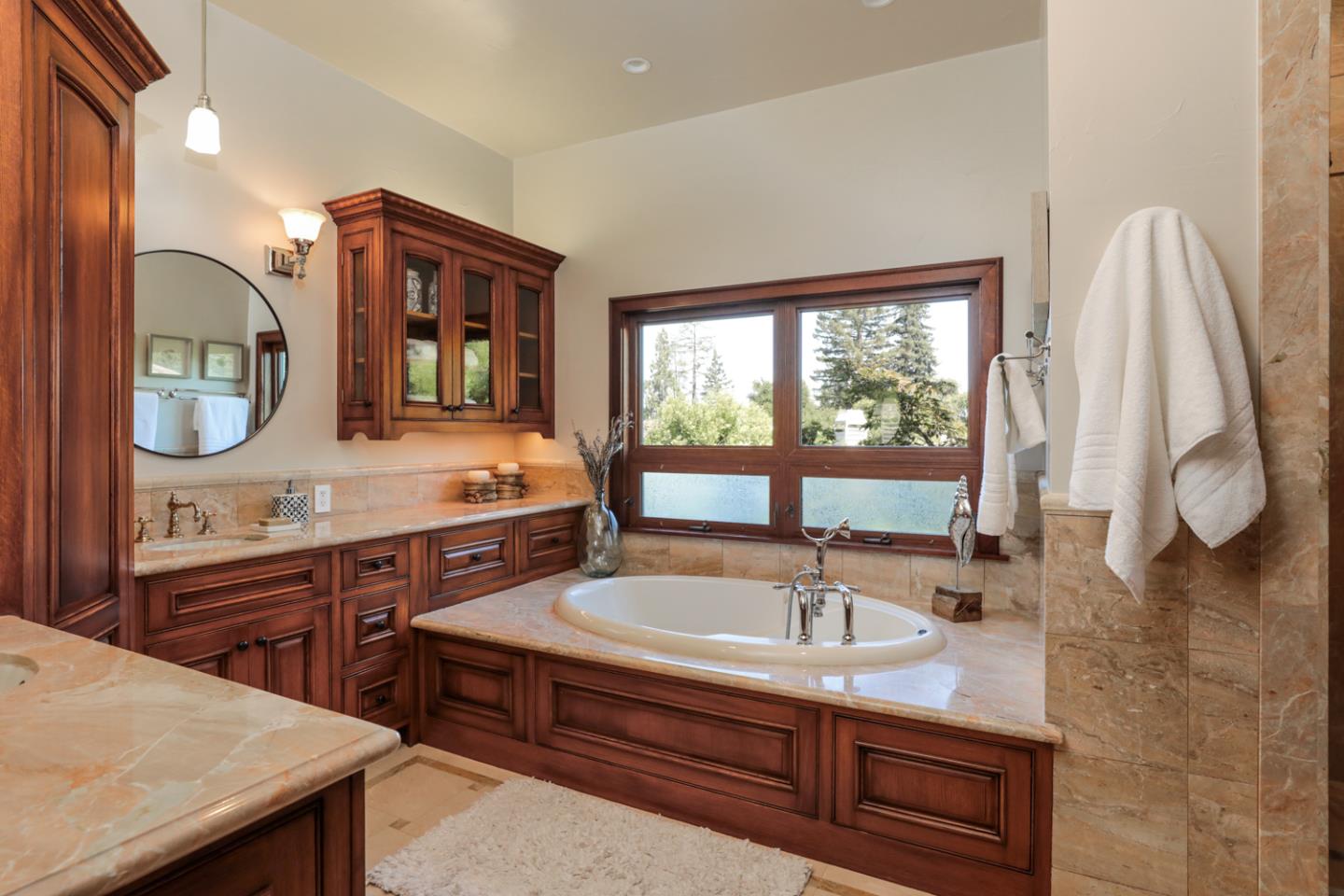 255 Lyell Street Los Altos, CA 94022 - Photo 36 of 50 a bathroom with a sink and a mirror