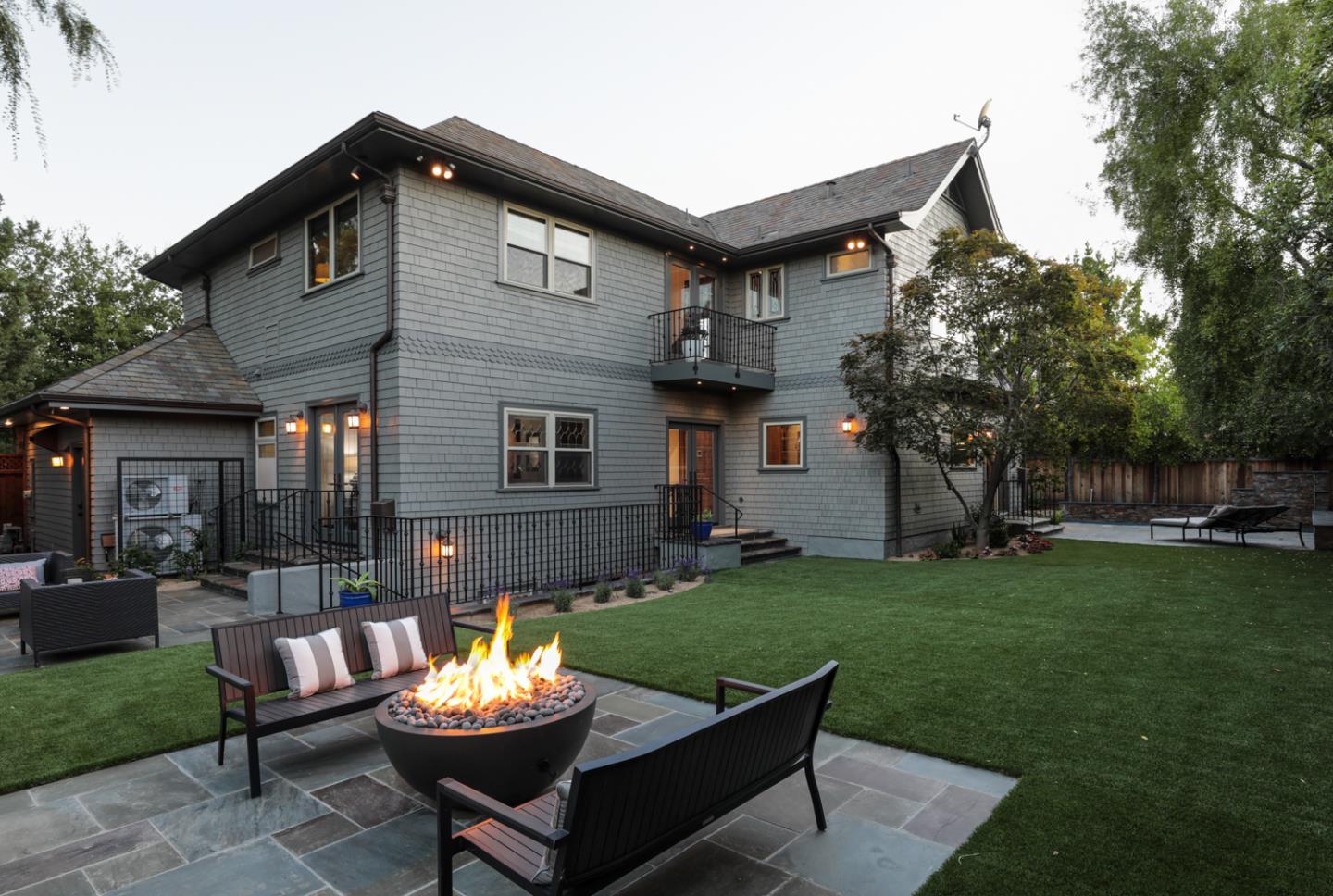 255 Lyell Street Los Altos, CA 94022 - Photo 5 of 50 a view of a house with a yard patio and a fire pit