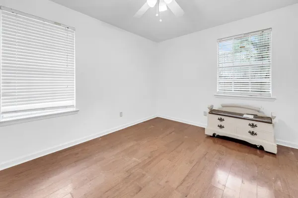 a room with a bed and a window