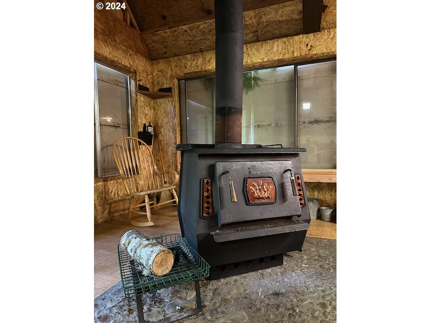 29990 Southeast Knox Road Boring, OR 97009 - Photo 9 of 41 a living room with furniture and a fireplace
