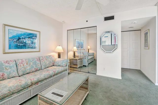 an aerial view of a house with yard