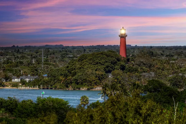a view of a field with an ocean