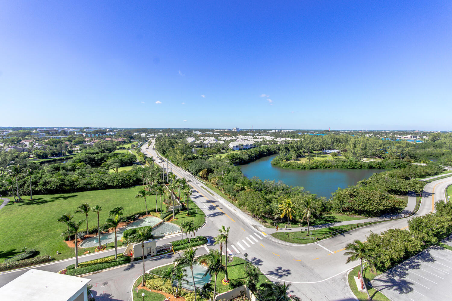 200 Ocean Trail Way, Unit 1009 Jupiter, FL 33477 - Photo 27 of 36 an aerial view of a city and lake view
