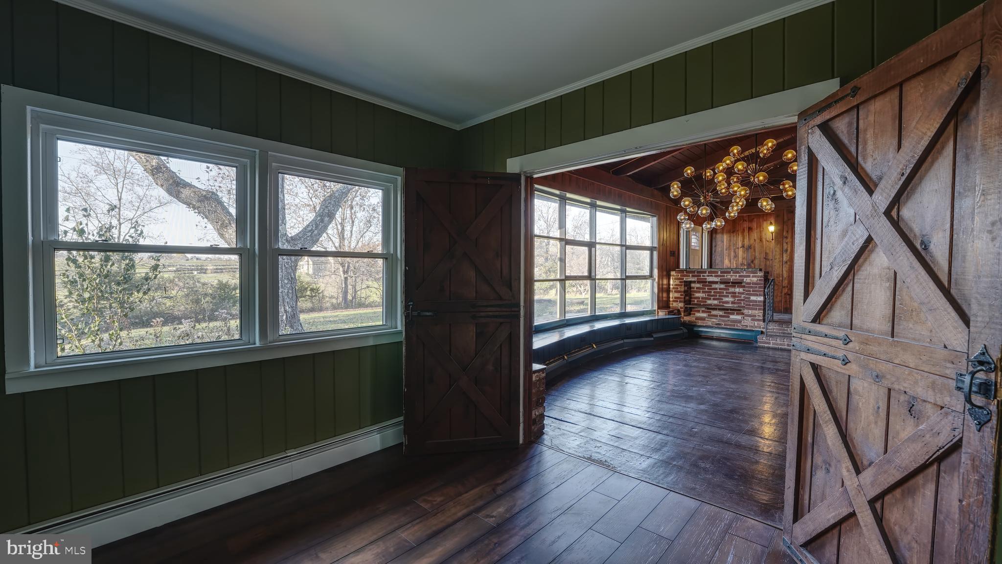 53 Iron Bridge Road Pipersville, PA 18947 - Photo 20 of 28 wooden floor in an empty room with a window