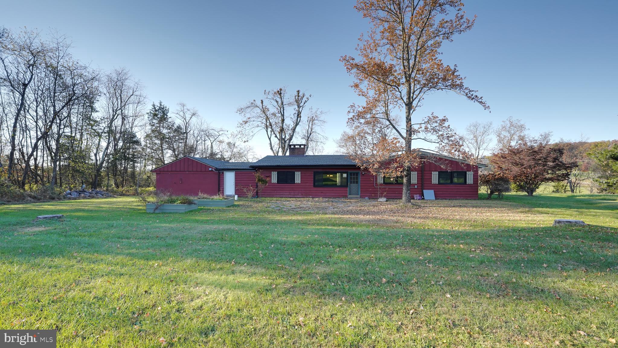 53 Iron Bridge Road Pipersville, PA 18947 - Photo 25 of 28 a view of a big yard with large trees