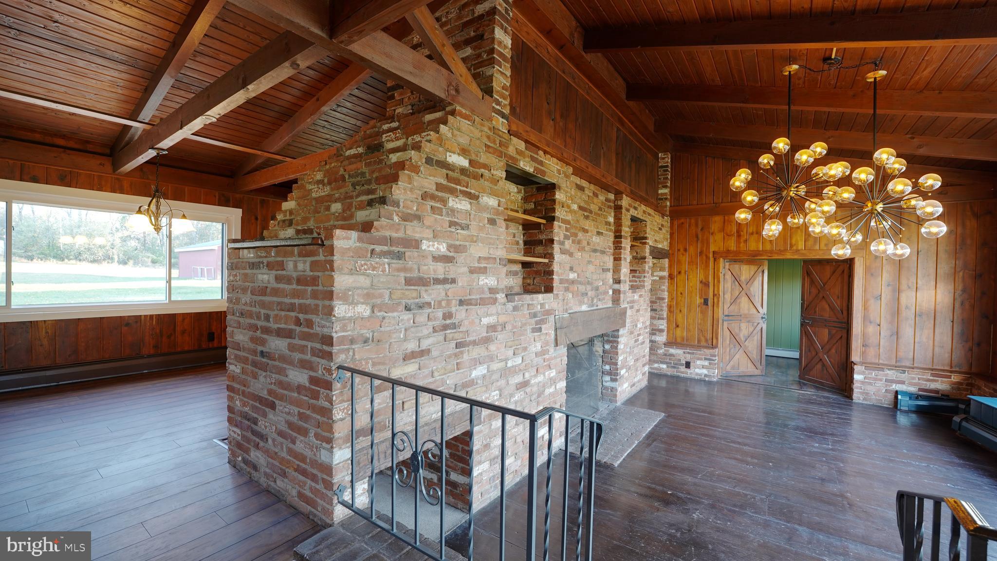 53 Iron Bridge Road Pipersville, PA 18947 - Photo 4 of 28 a view of entryway with wooden floor