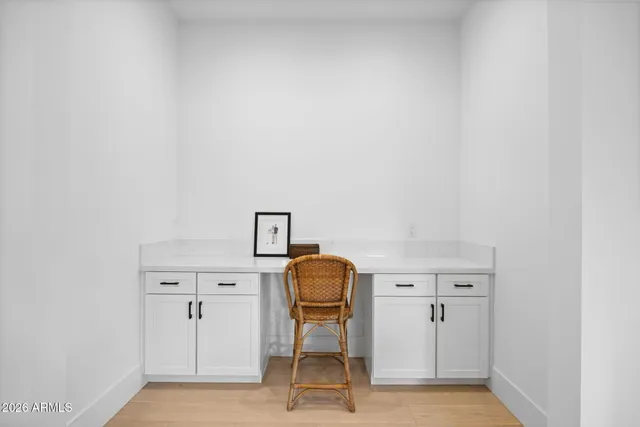 a view of workspace with cabinet