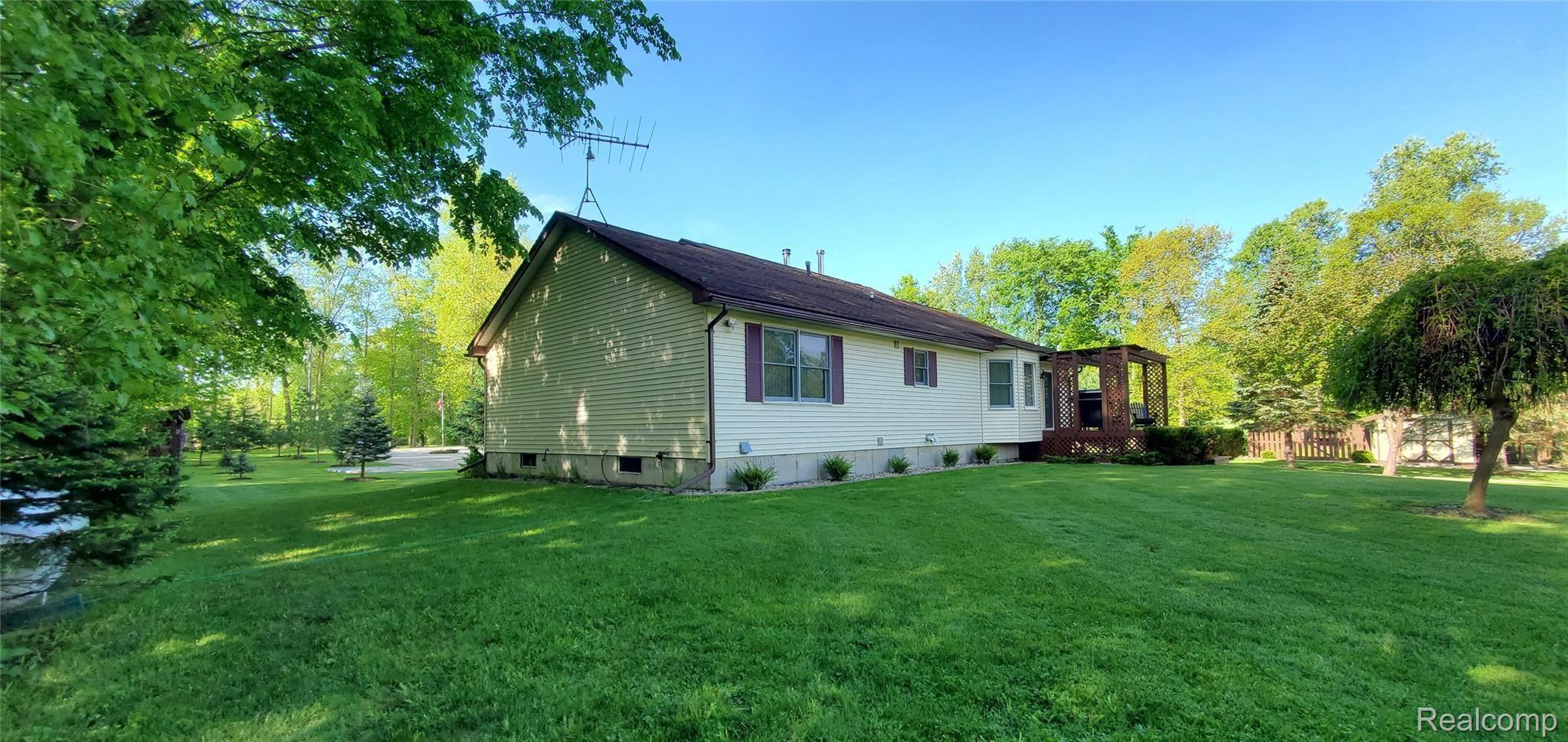 5520 Lowe Road Fowlerville, MI 48836 - Photo 6 of 86 5520 West Lowe Rd Rear Left side view