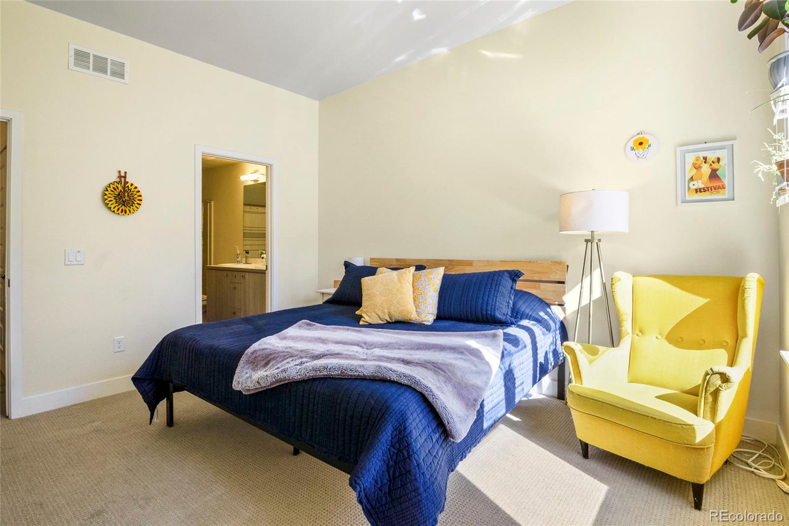 3080 Wilson Court, Unit 3 Denver, CO 80205 - Photo 21 of 28 a bedroom with a bed and a couch