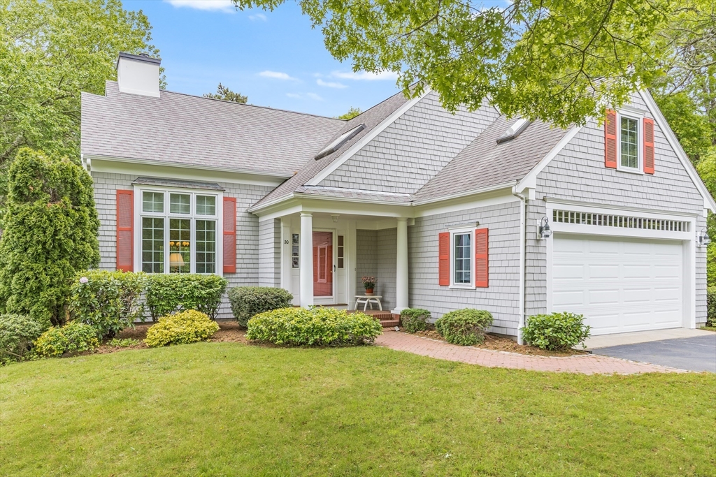front view of a house and a yard