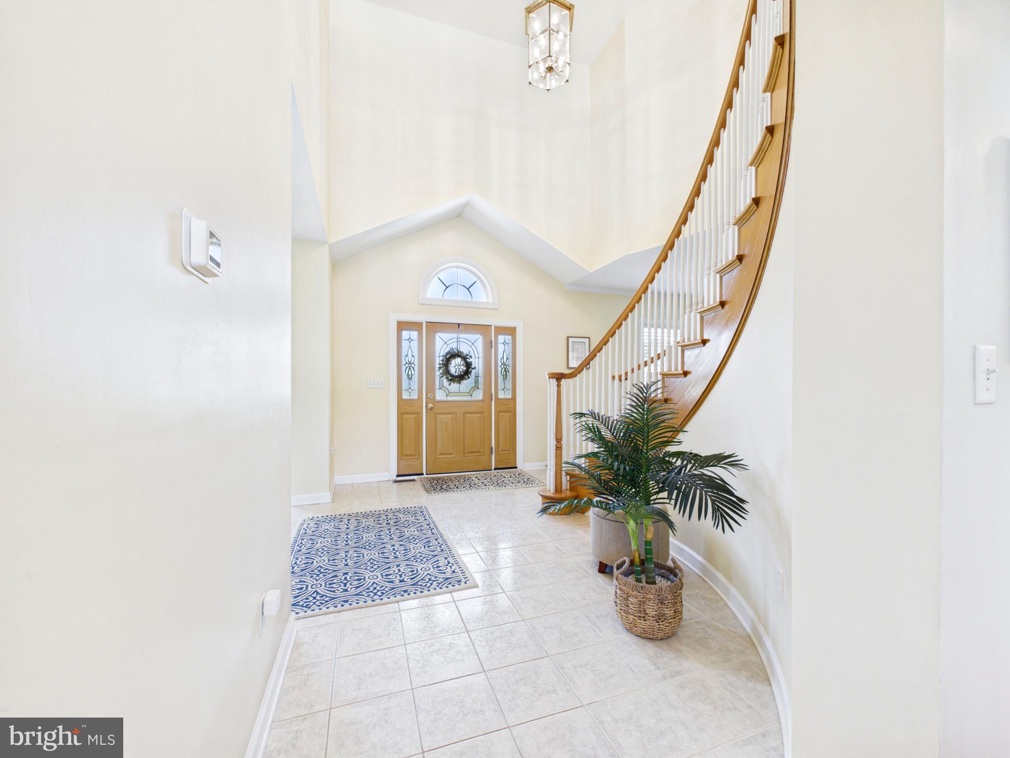 3298 Canterbury Road Milford, DE 19963 - Photo 3 of 74 Grand Foyer & Curved Staircase