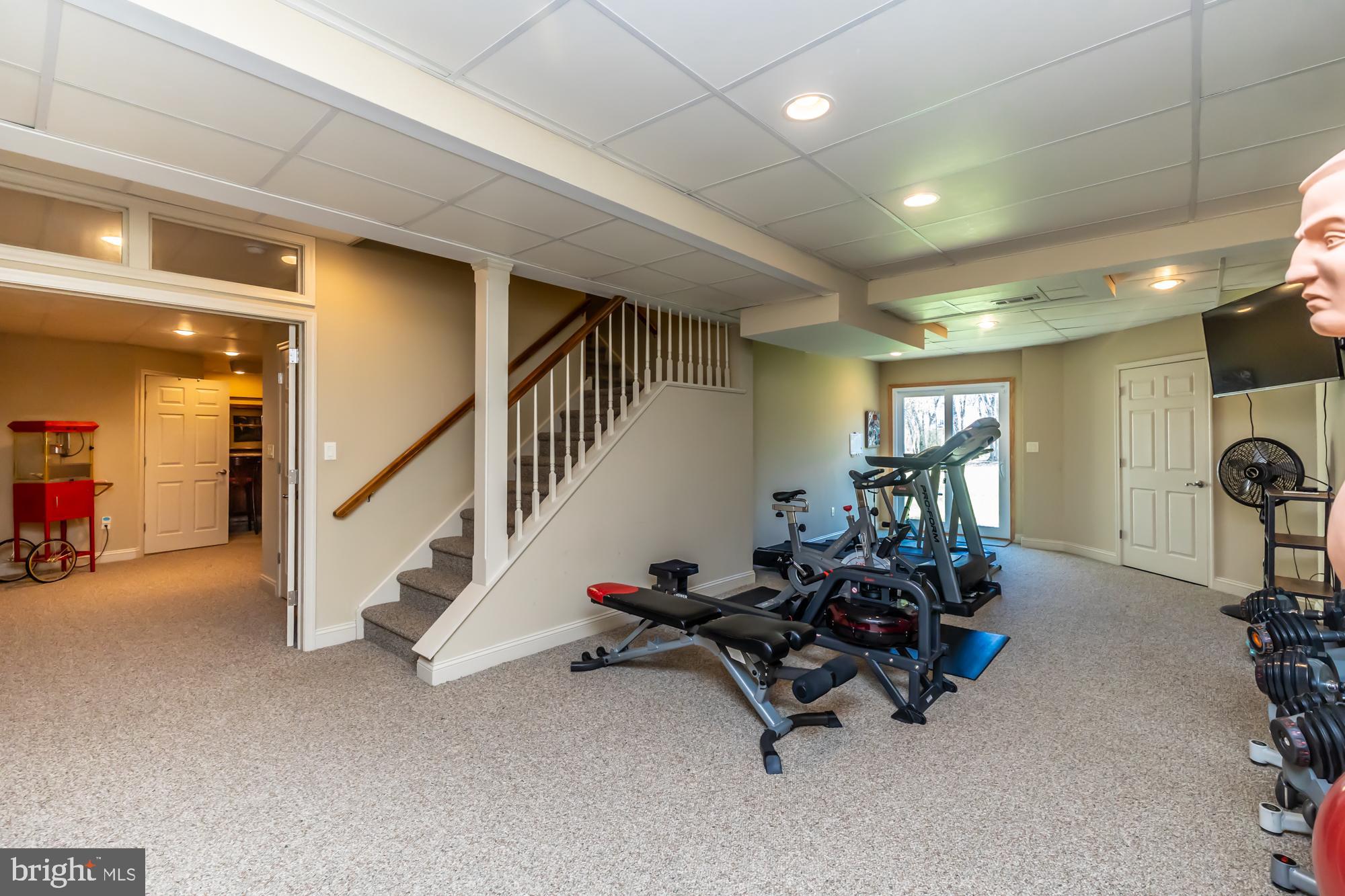 1537 Foxbury Road Ambler, PA 19002 - Photo 39 of 52 a room with gym equipment and a large window