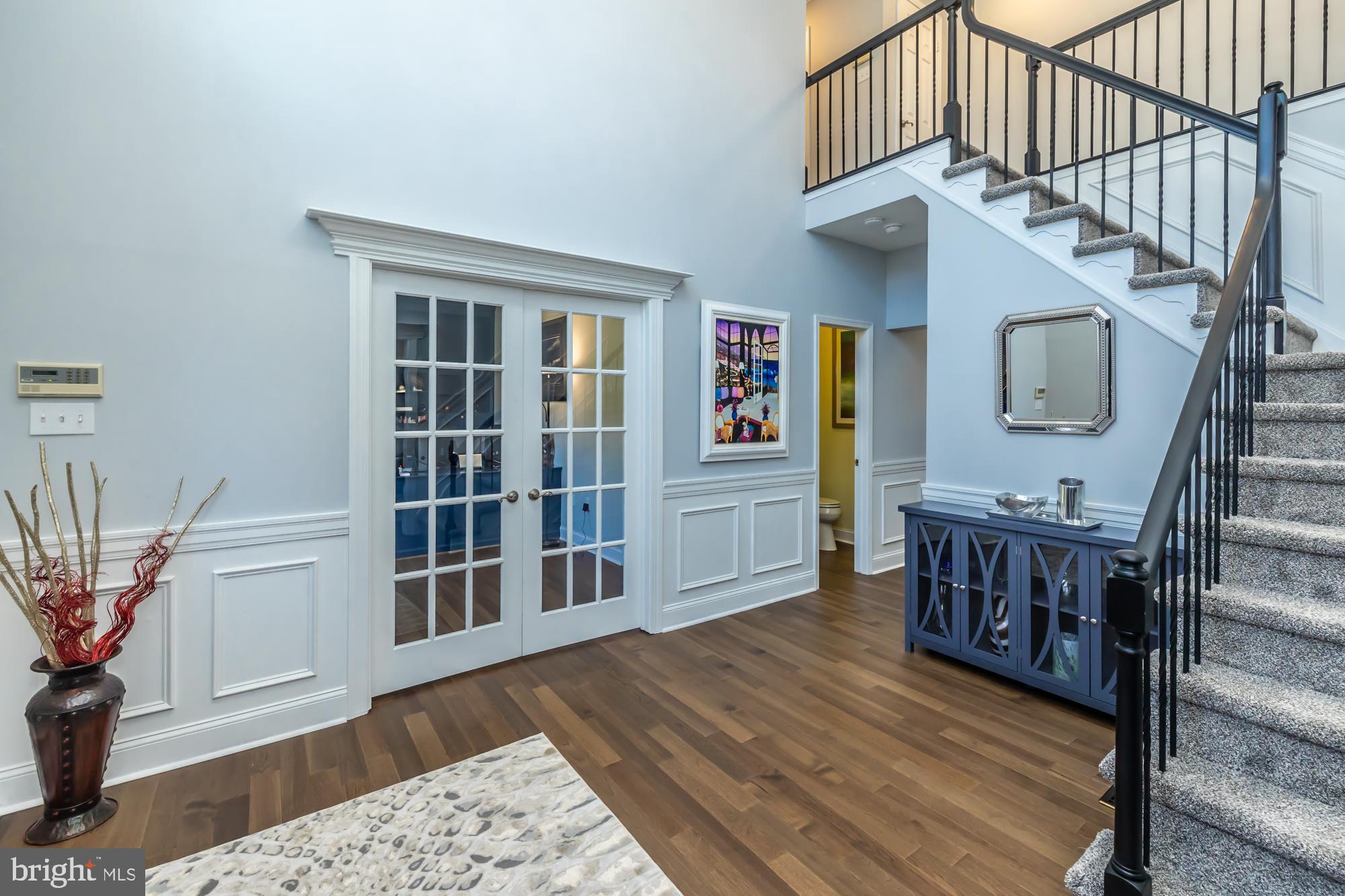 1537 Foxbury Road Ambler, PA 19002 - Photo 7 of 52 a view of an entryway with wooden floor