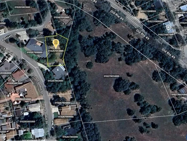 an aerial view of waterside residential houses with outdoor space