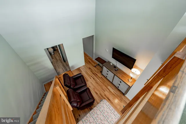 a bedroom with a bed and a table