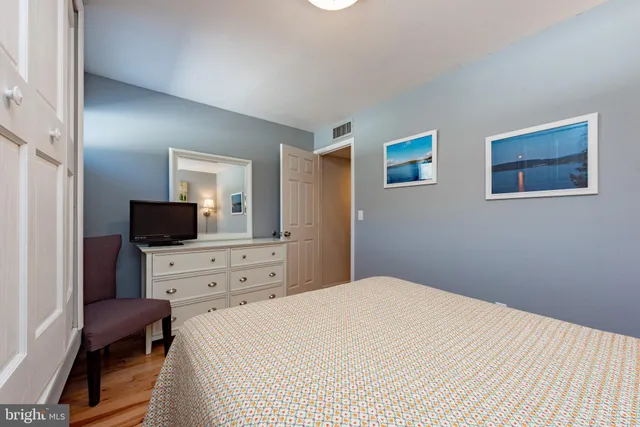 a bathroom with a shower and toilet