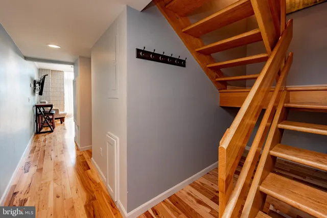 a kitchen with stainless steel appliances granite countertop white cabinets and a granite counter tops
