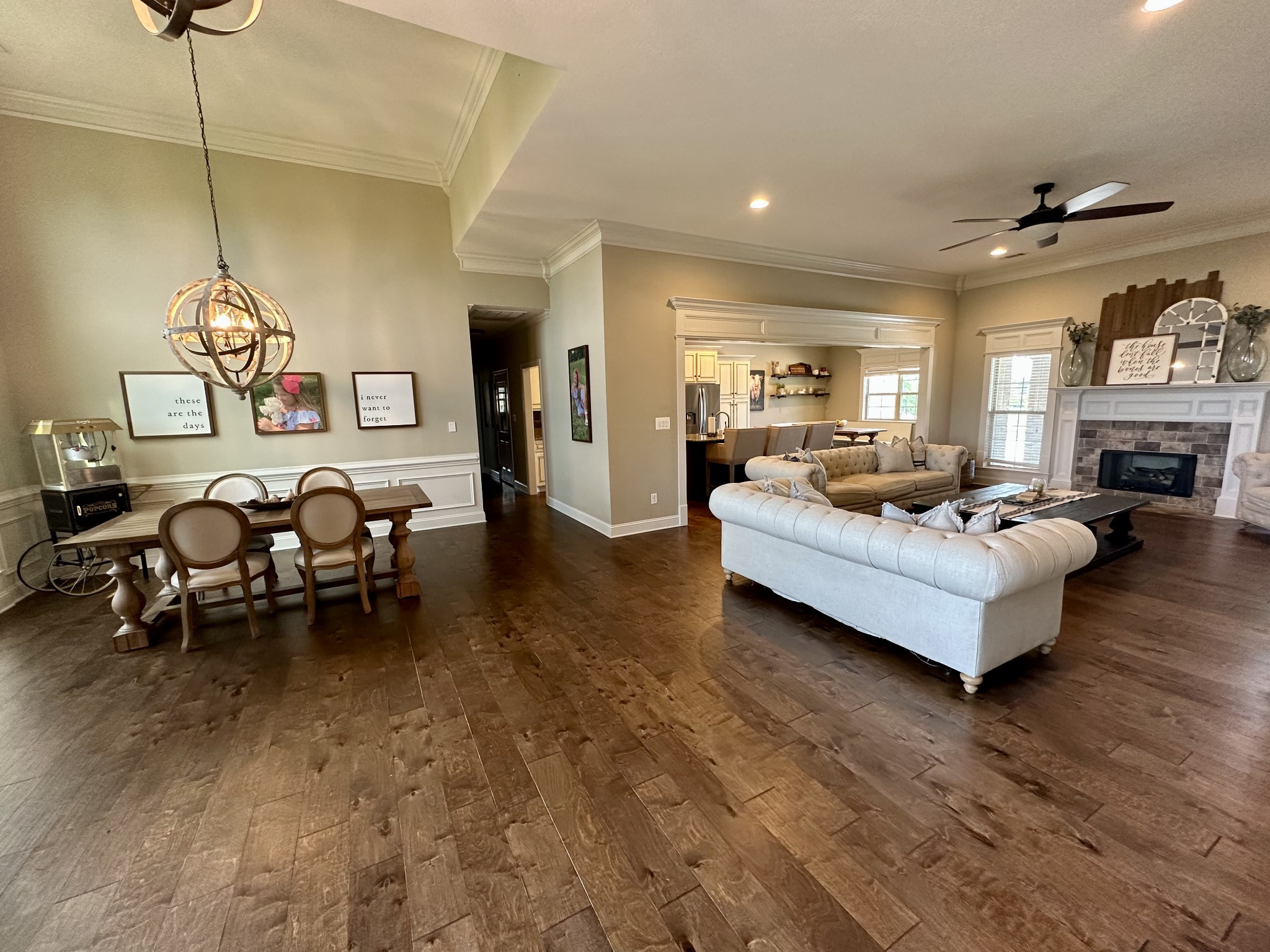 106 Rhodes Road Big Sandy, TN 38221 - Photo 14 of 49 a living room with furniture and a chandelier