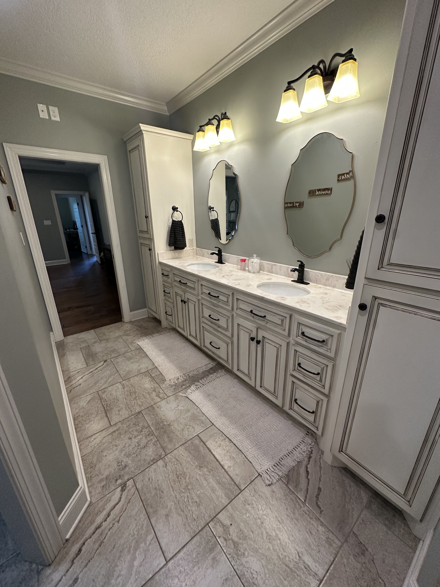 106 Rhodes Road Big Sandy, TN 38221 - Photo 36 of 49 a spacious bathroom with a double vanity sink and a mirror