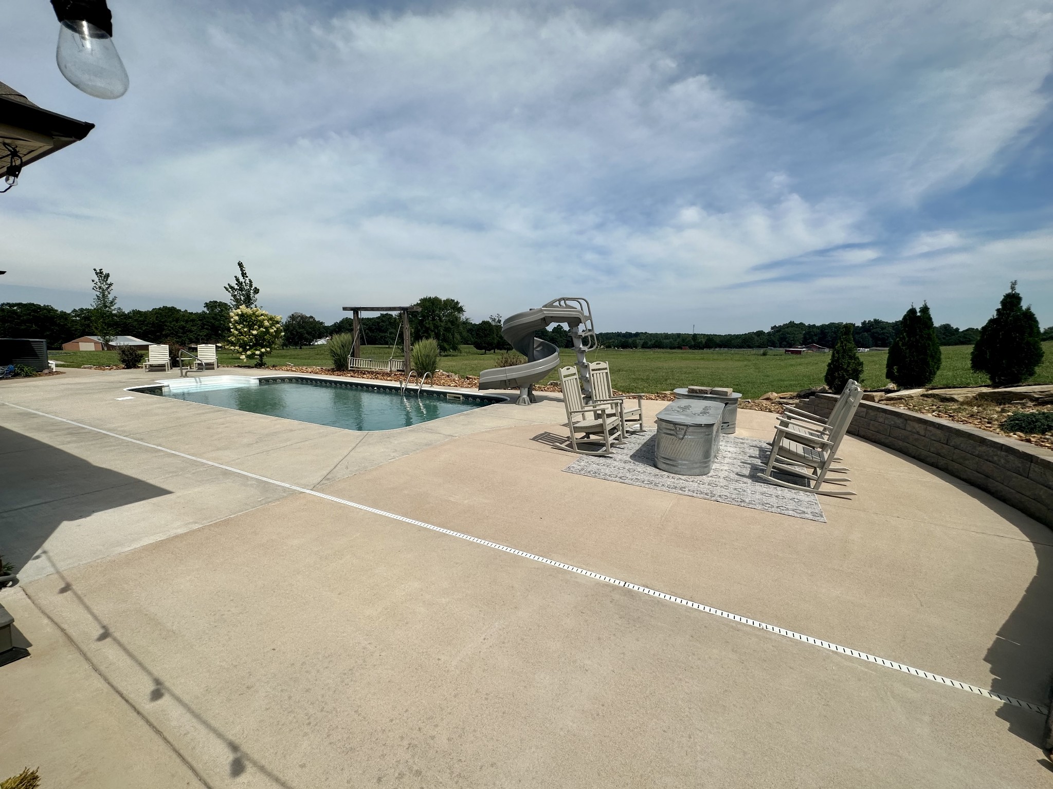 106 Rhodes Road Big Sandy, TN 38221 - Photo 42 of 49 a view of a swimming pool with lounge chair