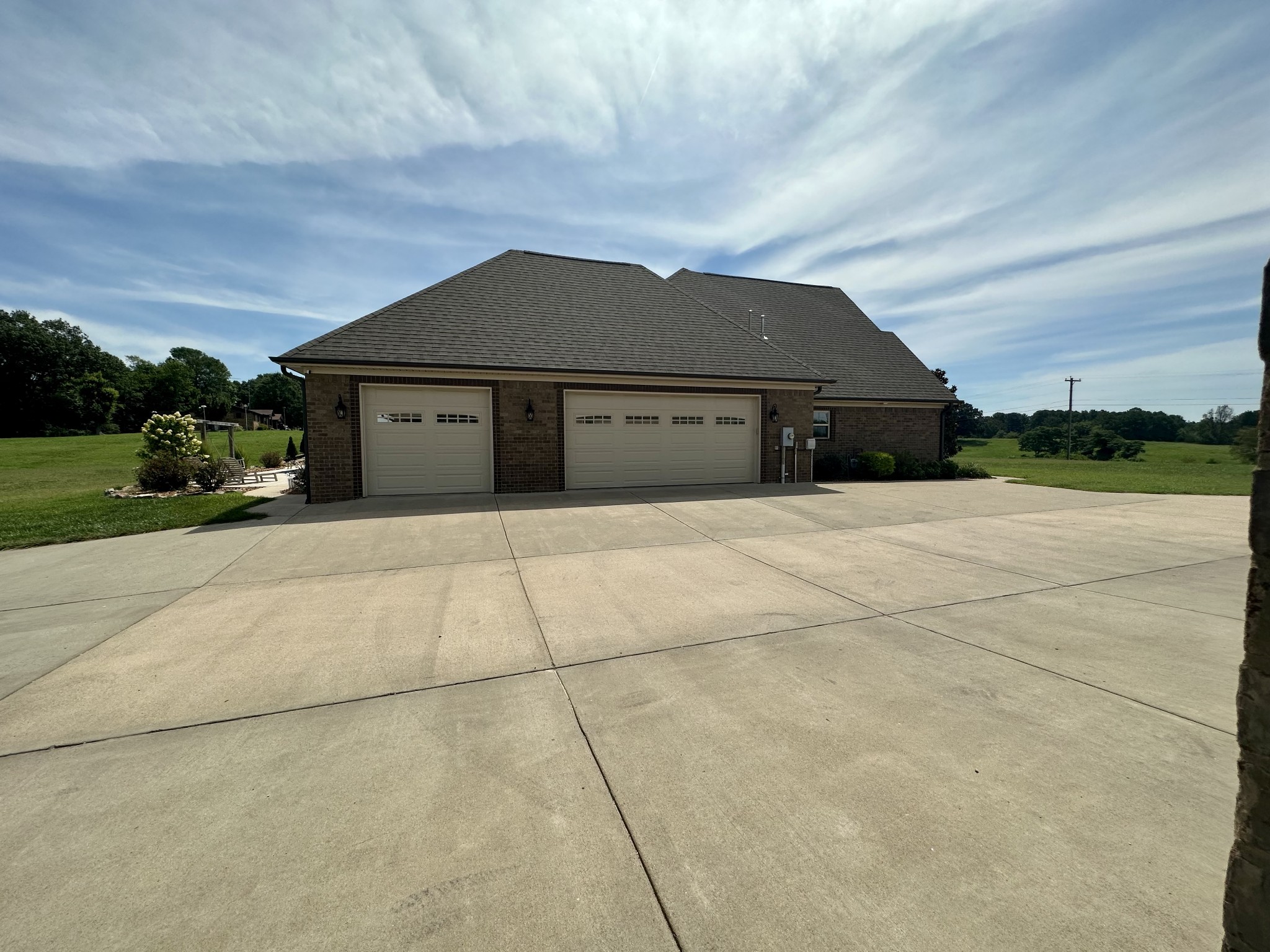 106 Rhodes Road Big Sandy, TN 38221 - Photo 8 of 49 a front view of house with yard