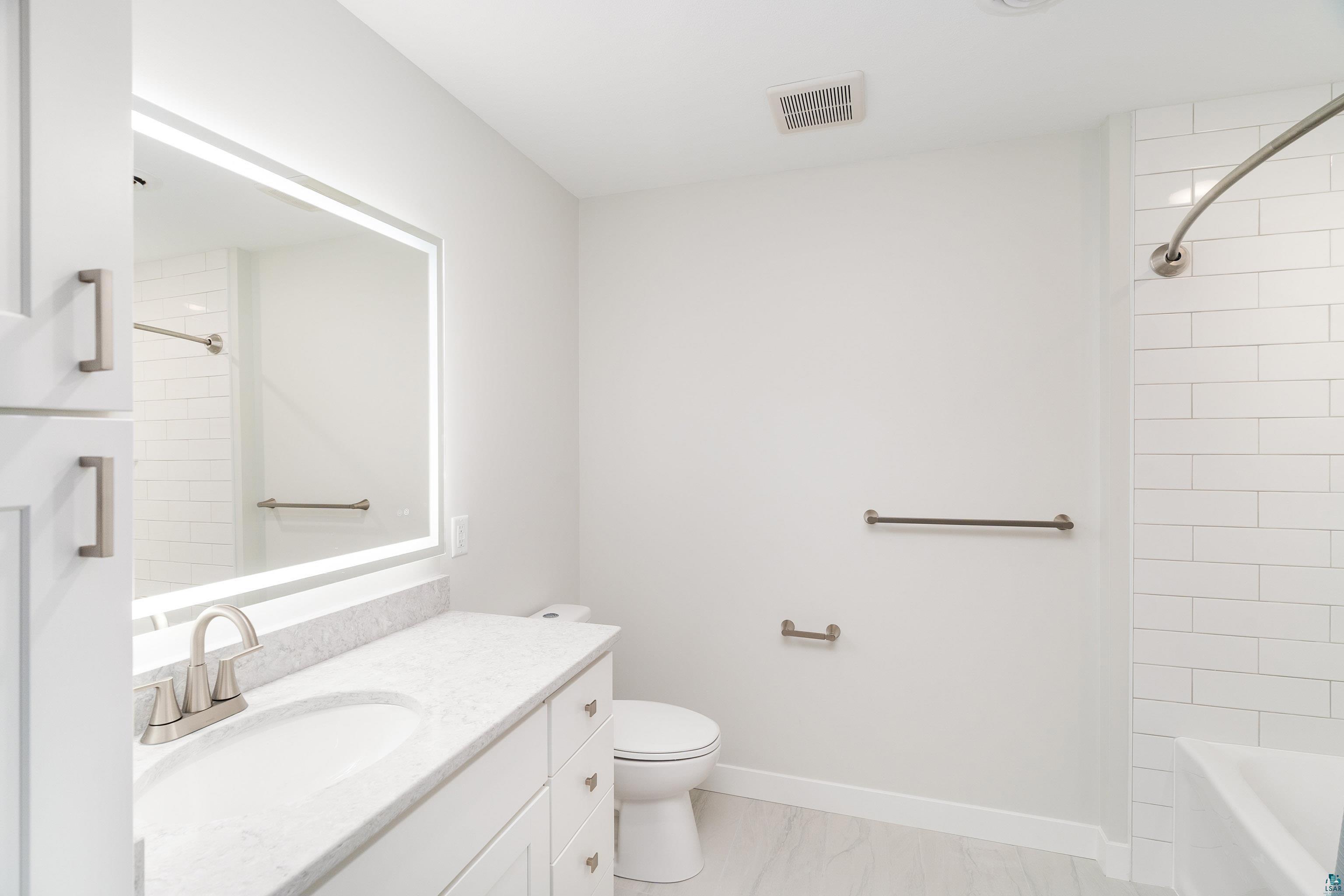 3829 Stebner Road Hermantown, MN 55811 - Photo 20 of 28 Shared bath with smart touch lighting