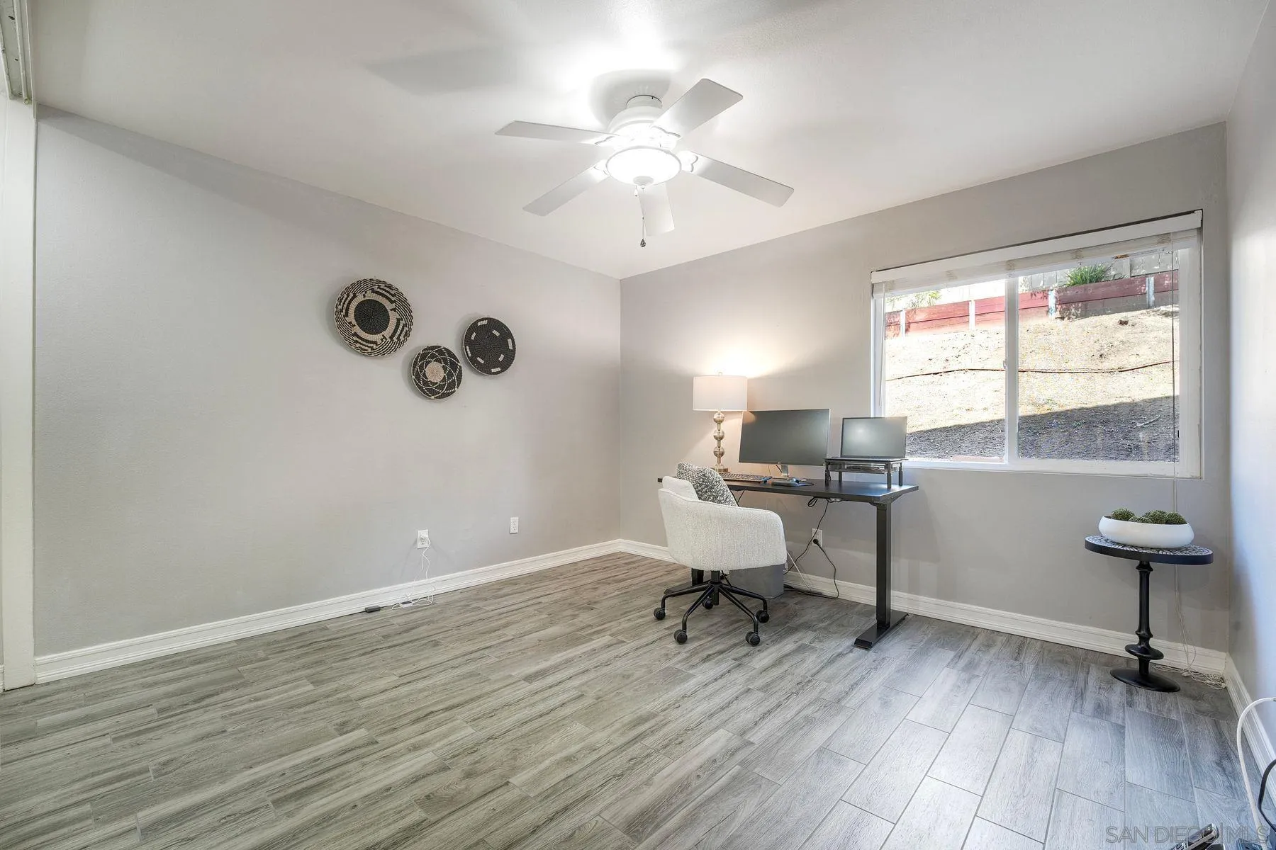 17240 Cuvee Court Poway, CA 92064 - Photo 18 of 62 a workspace with wooden floor and a window
