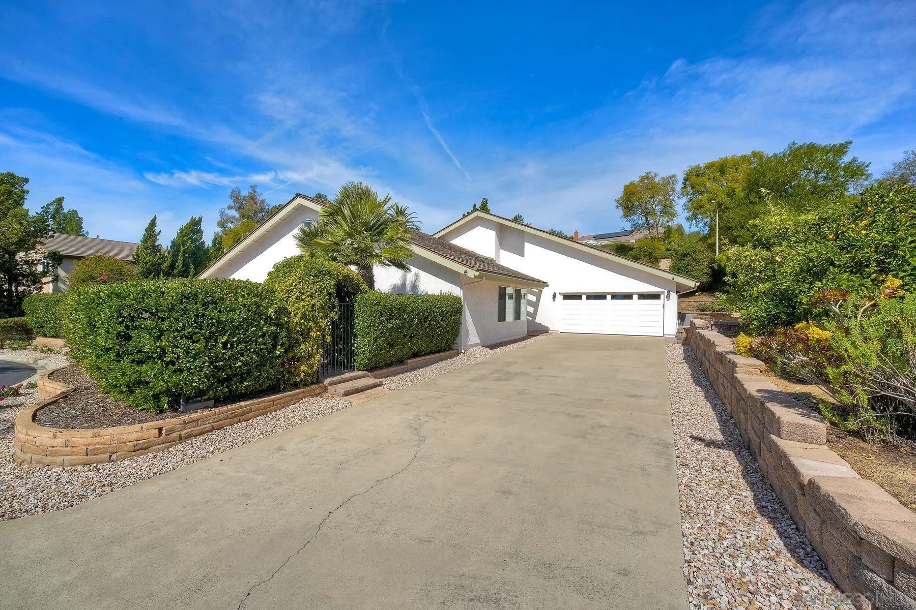 17240 Cuvee Court Poway, CA 92064 - Photo 2 of 62 a view of a street with a building in the background