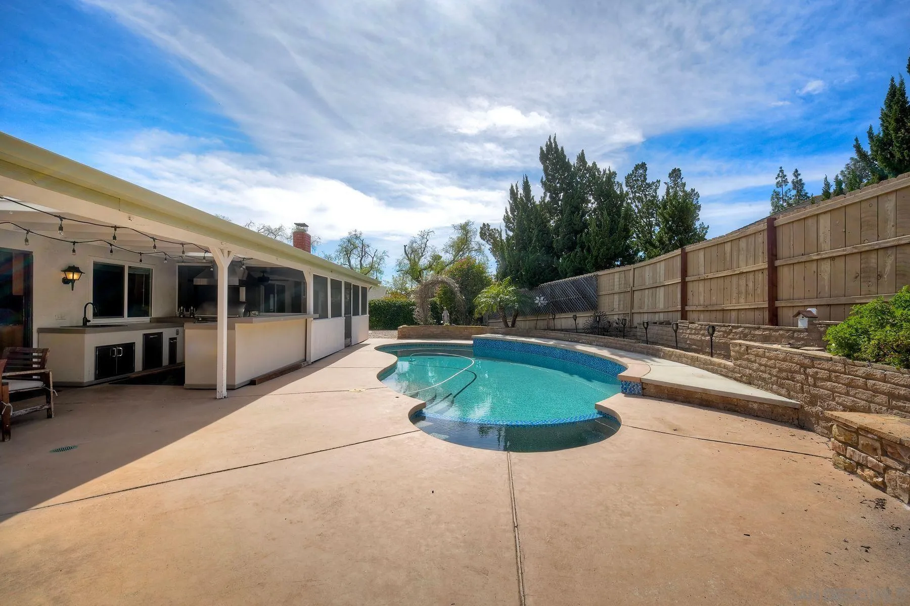 17240 Cuvee Court Poway, CA 92064 - Photo 29 of 62 a view of a swimming pool with a patio