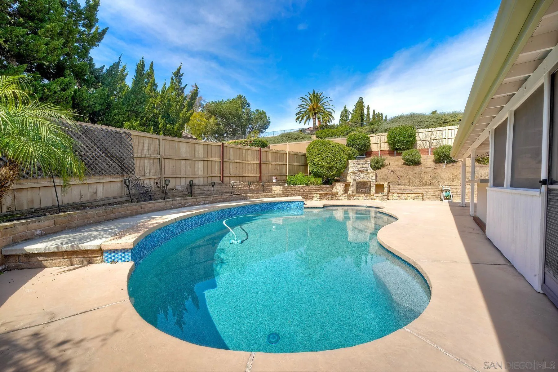 17240 Cuvee Court Poway, CA 92064 - Photo 31 of 62 a view of a swimming pool with an outdoor seating
