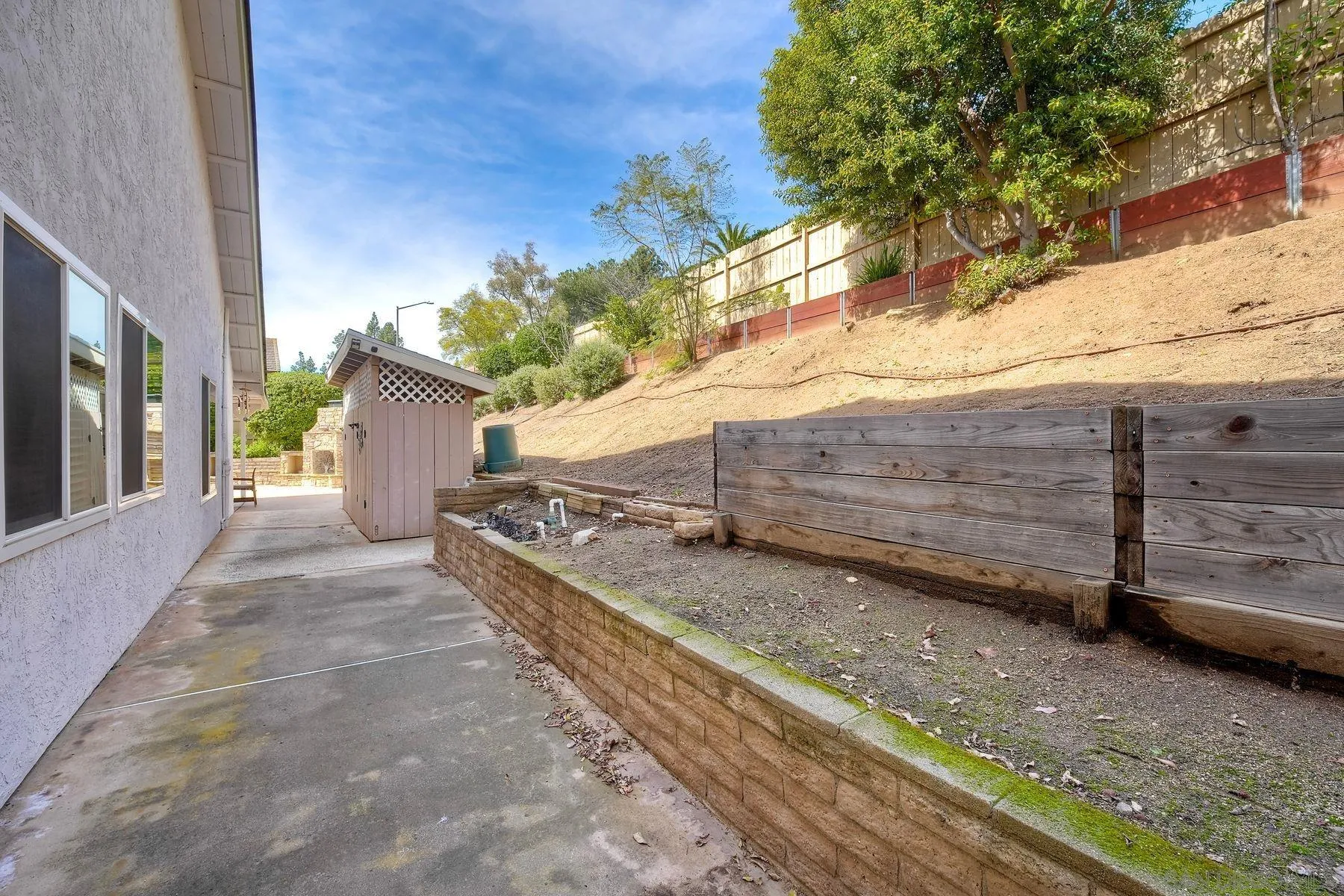 17240 Cuvee Court Poway, CA 92064 - Photo 34 of 62 a view of a house with a road