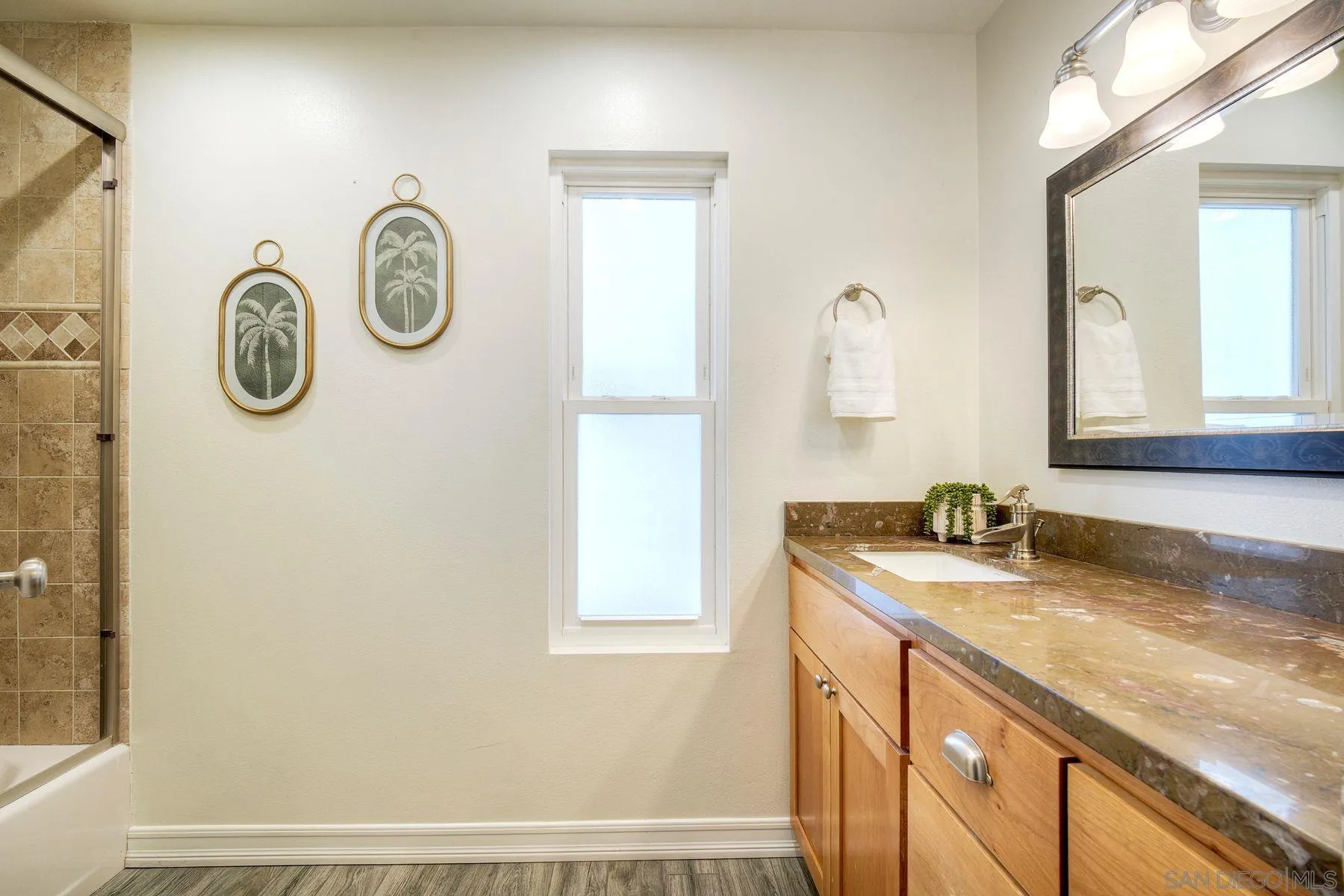 17240 Cuvee Court Poway, CA 92064 - Photo 35 of 62 a bathroom with a granite countertop sink and a mirror