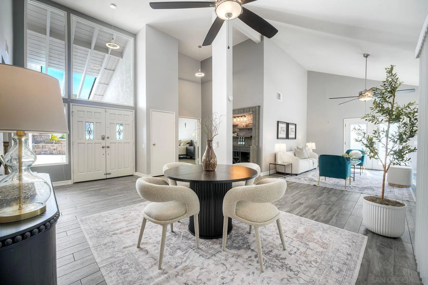 17240 Cuvee Court Poway, CA 92064 - Photo 7 of 62 a living room with fireplace furniture and a potted plant